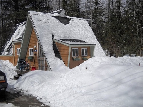 winter picture of Camp Isnowhere surounded by snow