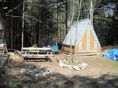 Side yard with shed and fire pit