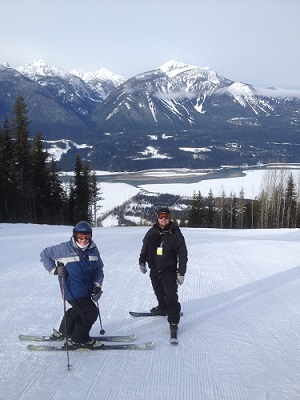 Friends skiing at the top of Revelstoke Mountain